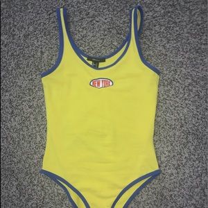 yellow bodysuit
